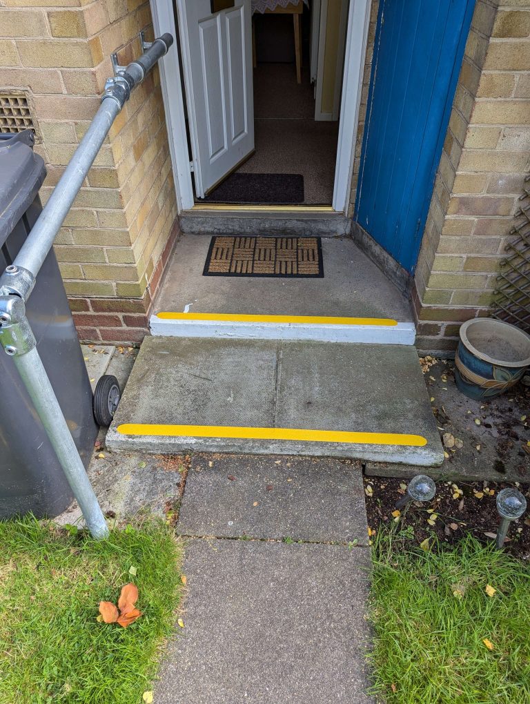 Front steps leading into Mrs. D's Bungalow